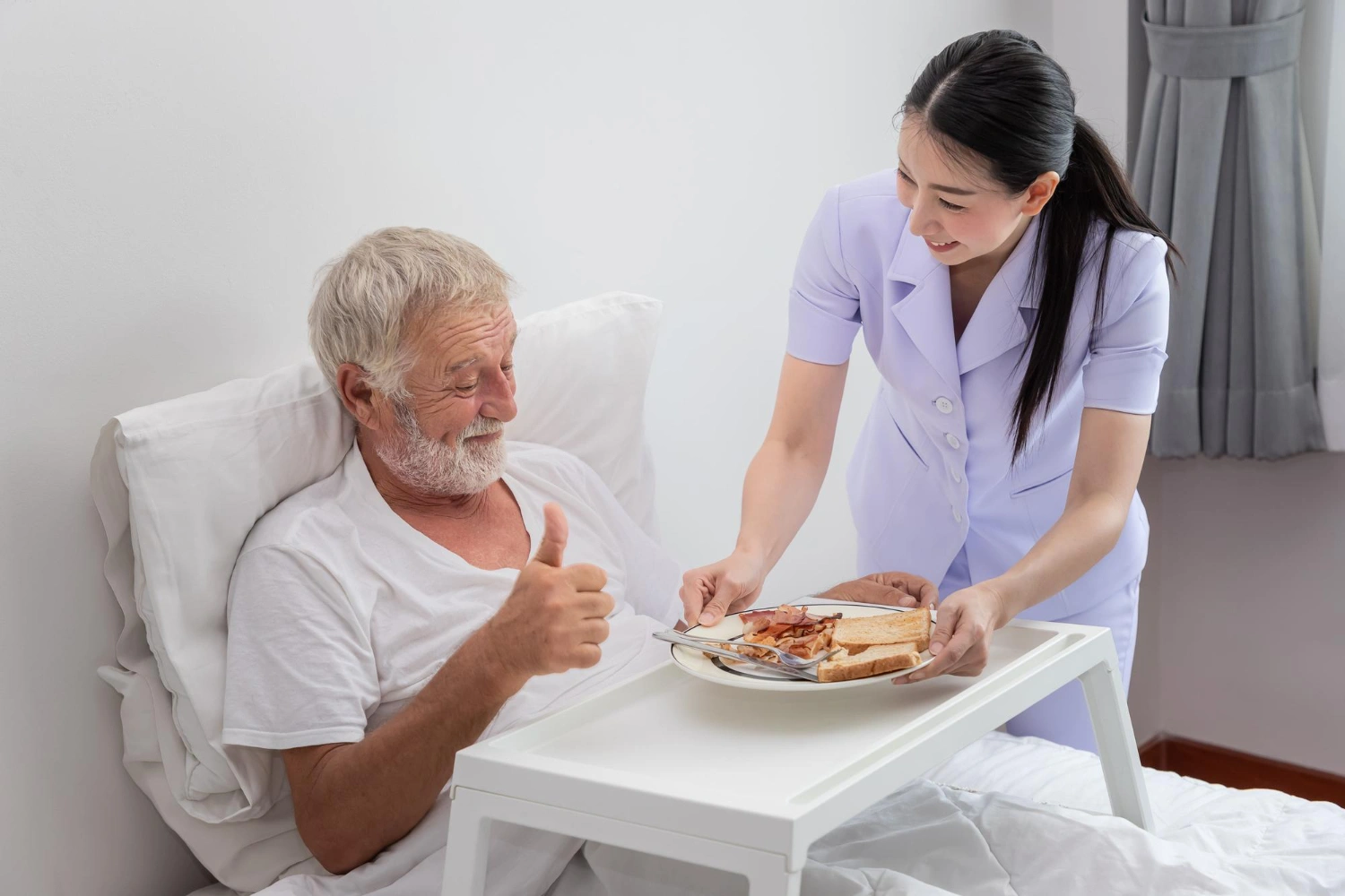 Caregiver Assisting Patient at Home